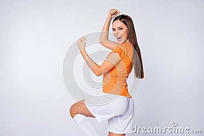 Profile photo of bookmaker joyful lady soccer team captain euro cup 2020 league raise fists win bets wear national team Stock Photo