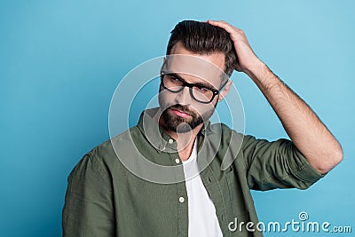 Profile photo of intelligent virile cool guy enjoy new haircut wear green shirt isolated blue color background Stock Photo