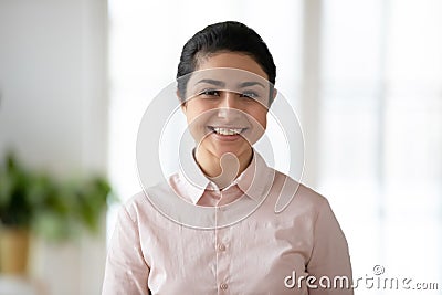 Profile picture of smiling Indian female employee Stock Photo