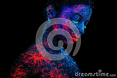 Profile portrait of a beautiful girl alien. Ultraviolet body art blue night sky with stars and pink jellyfish Stock Photo