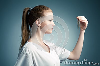 Profile portrait of young smiling medical doctor woman Stock Photo