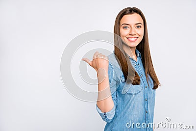 Profile side photo of positive confident cool promoter girl point thumb direct way to adverts suggest pick select Stock Photo