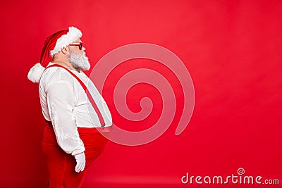 Profile side photo of white gray hair fat overweight santa claus with big funny belly abdomen ready for new year Stock Photo