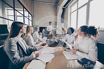 Profile side view of nice attractive stylish focused coworkers listening presenter workshop staff training seminar Stock Photo