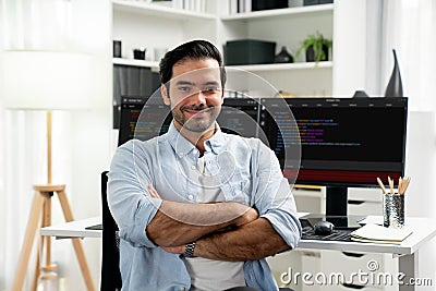 Profile smart IT developer looking camera against on coding pc screen. Surmise. Stock Photo