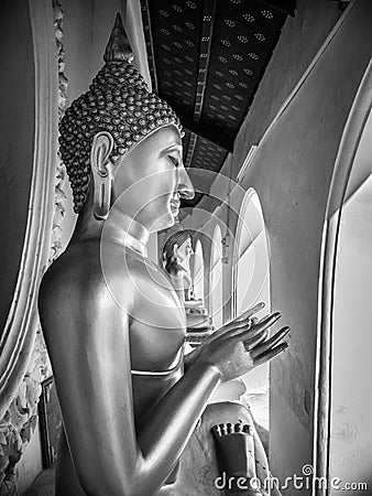 Profile view of statue of Buddha in buddhist temple, peaceful and serenity, beautiful background Stock Photo