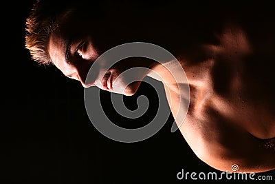 Profile of a young muscular ma Stock Photo