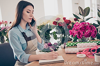 Profilse side view photo concentrated lady hold hand modern technology pensive plan writer get receive order delivery Stock Photo