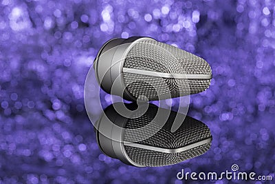 Professional microphone in unfocused background. Mic Stock Photo