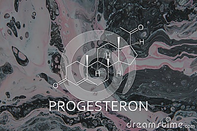 progesterone chemical formula Hand with pen drawing Stock Photo