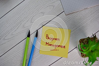 Program Management write on sticky notes isolated on Wooden Table Stock Photo