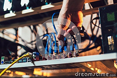 Programmer configures hardware for mining Stock Photo