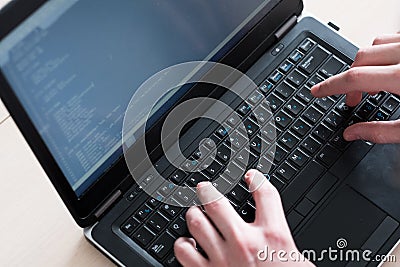 Programmer courses typing code laptop software Stock Photo