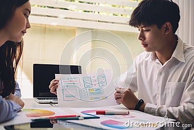 Programmer engineers discussion and drawing website ux app for start new project web design in company office. Developing Stock Photo