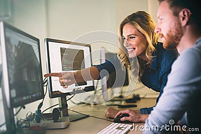 Programmer working in a software developing company Stock Photo