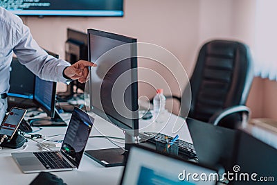 Programmers engrossed in deep collaboration, diligently working together to solve complex problems and develop Stock Photo