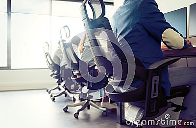 Programmers cooperating at IT company developing apps Stock Photo