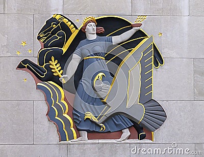 `Progress` by Lee Lawrie located above the north, 49th street facade of One Rockefeller Center in New York City. Editorial Stock Photo
