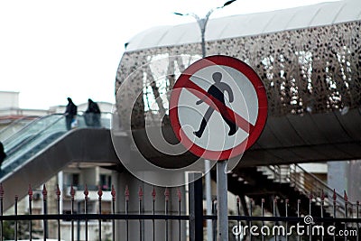 Prohibition No Pedestrian Sign, no entry sign, a warning sign not to cross the road, selective focus Stock Photo