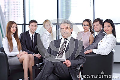 Project Manager against the background of the business team Stock Photo