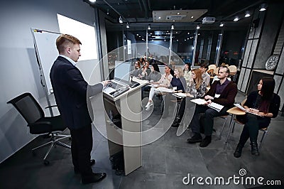 Project Manager conducts a meeting of senior staff. Stock Photo