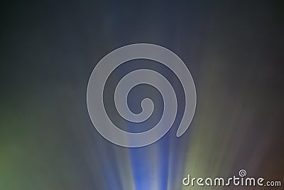 Projector colored light beam through smoke for movie and cinema at night Stock Photo