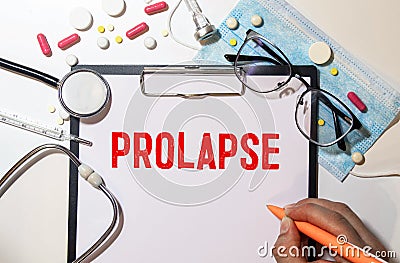 PROLAPSE word on a paper with stethoscope and pills Stock Photo