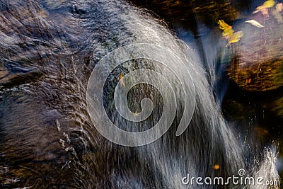 Prolonged exposure of clean river water flowing over rocks Stock Photo