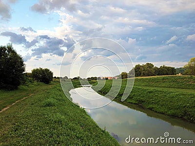 Promenade along the bank of the river Orljava or Setnica uz obalu rijeke Orljave Stock Photo