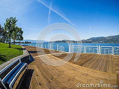 Promenade along the Okanagan Lake waterfront in Kelowna, BC Stock Photo