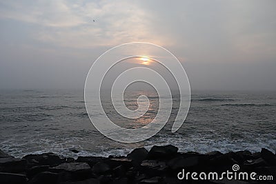 Promenade beach in Puducherry - sunrise - colors in sky - India tourism Stock Photo