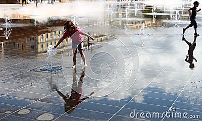 Promenade du Paillon, playing kids, Nice, France Editorial Stock Photo