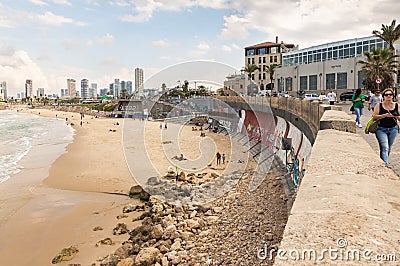 Promenade and free beach in the old town of Yafo and the skyscrapers of Tel Aviv in the distance, in Tel Aviv - Yafo city, Israel Editorial Stock Photo