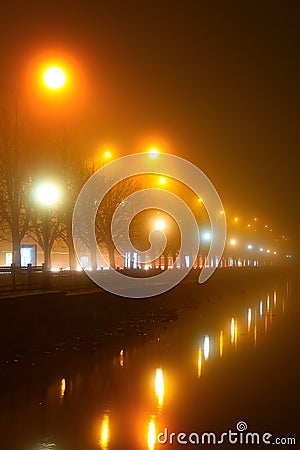 Promenade lights in the fog Stock Photo