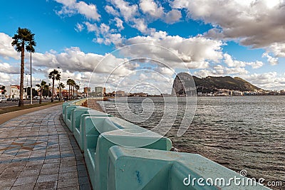 Promenade at Spanish La Linea town with town and rock of Gibraltar on a background. Editorial Stock Photo