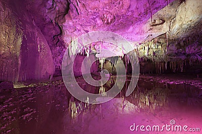 Prometheus Cave in purple illumination Stock Photo