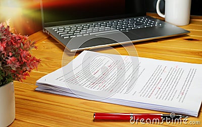 Proofreading paper on table Stock Photo