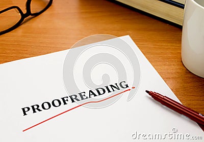 Proofreading word on white sheet with red pen Stock Photo