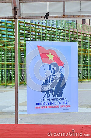 A propaganda poster about protecting the Spratly islands in the square in Vietnam Editorial Stock Photo