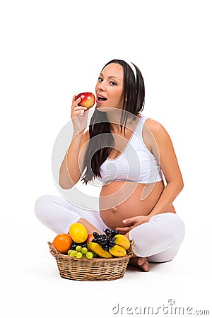 Proper nutrition during pregnancy. Vitamins and fruit. Stock Photo