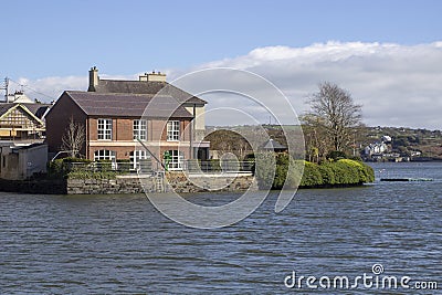 Properties on the waters edge at Kinsale Harbour in County Cork Stock Photo