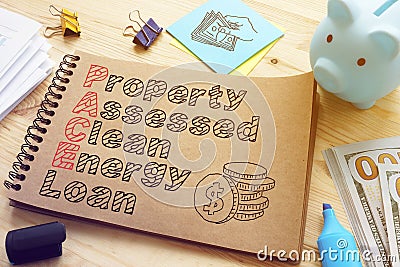Property Assessed Clean Energy PACE Loan is shown on the conceptual photo Stock Photo