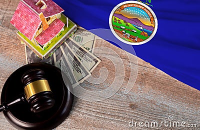 Property auction, flag Kansas, gavel wooden and model house on wooden background, lawyer of home real estate Stock Photo