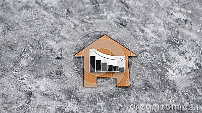 Property prices dropping, cardboard house with graphs with stats going down stock video