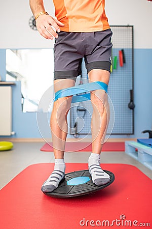 Proprioception with tablet. Exercise in therapeutic studies Stock Photo