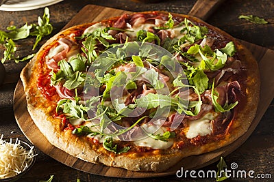 Prosciutto and Arugula Pizza Stock Photo