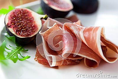 Prosciutto with fresh figs Stock Photo