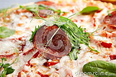 Prosciutto Funghi pizza on wooden board Stock Photo