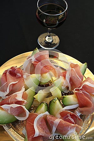 Prosciutto ham and Cantalope melon Stock Photo