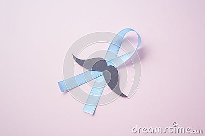 Prostate Cancer Awareness, light Blue Ribbon Stock Photo